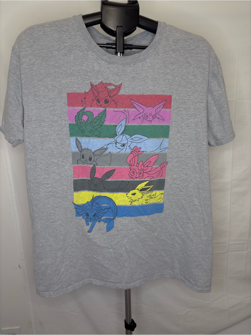 Pokemon Men’s Gray Eevee Evolutions Graphic Tee with Multicolor Accents